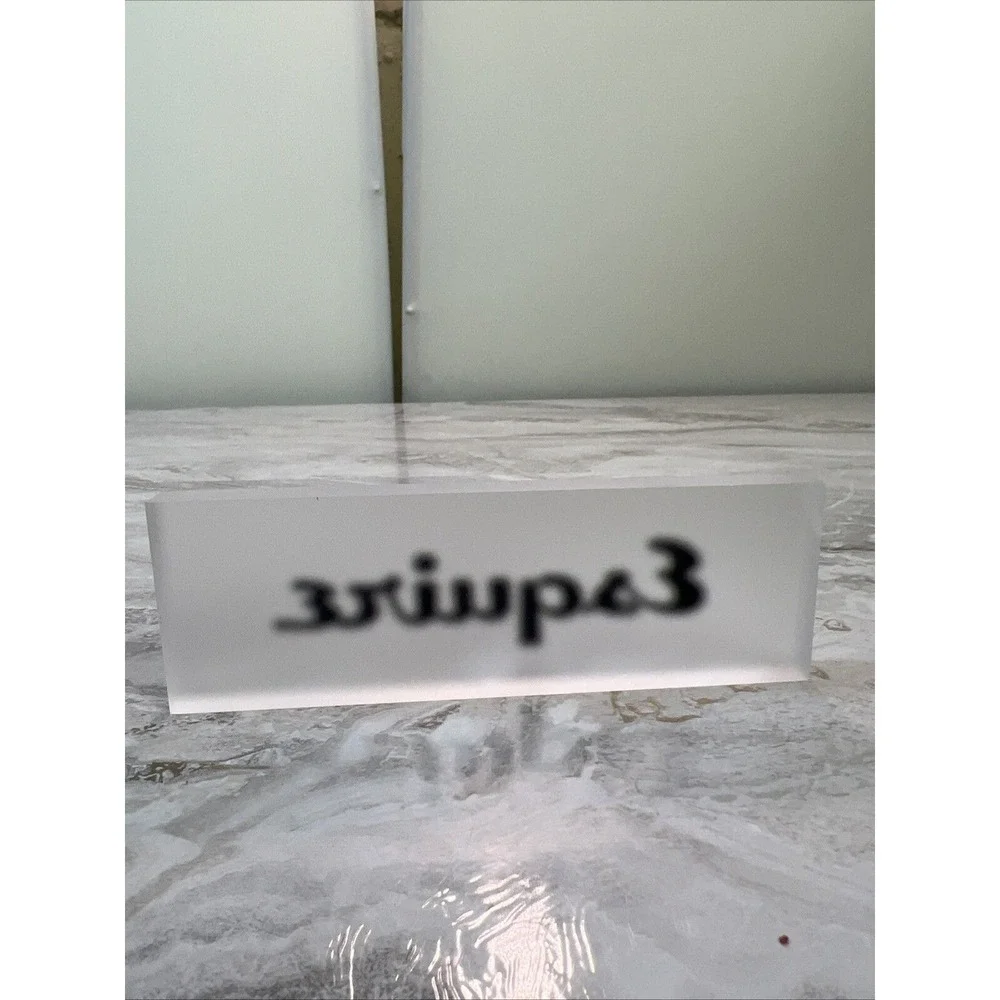 Esquire Store Display Promo Clear